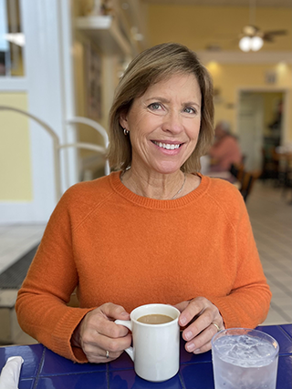 Terri Peter smiling at a cafe